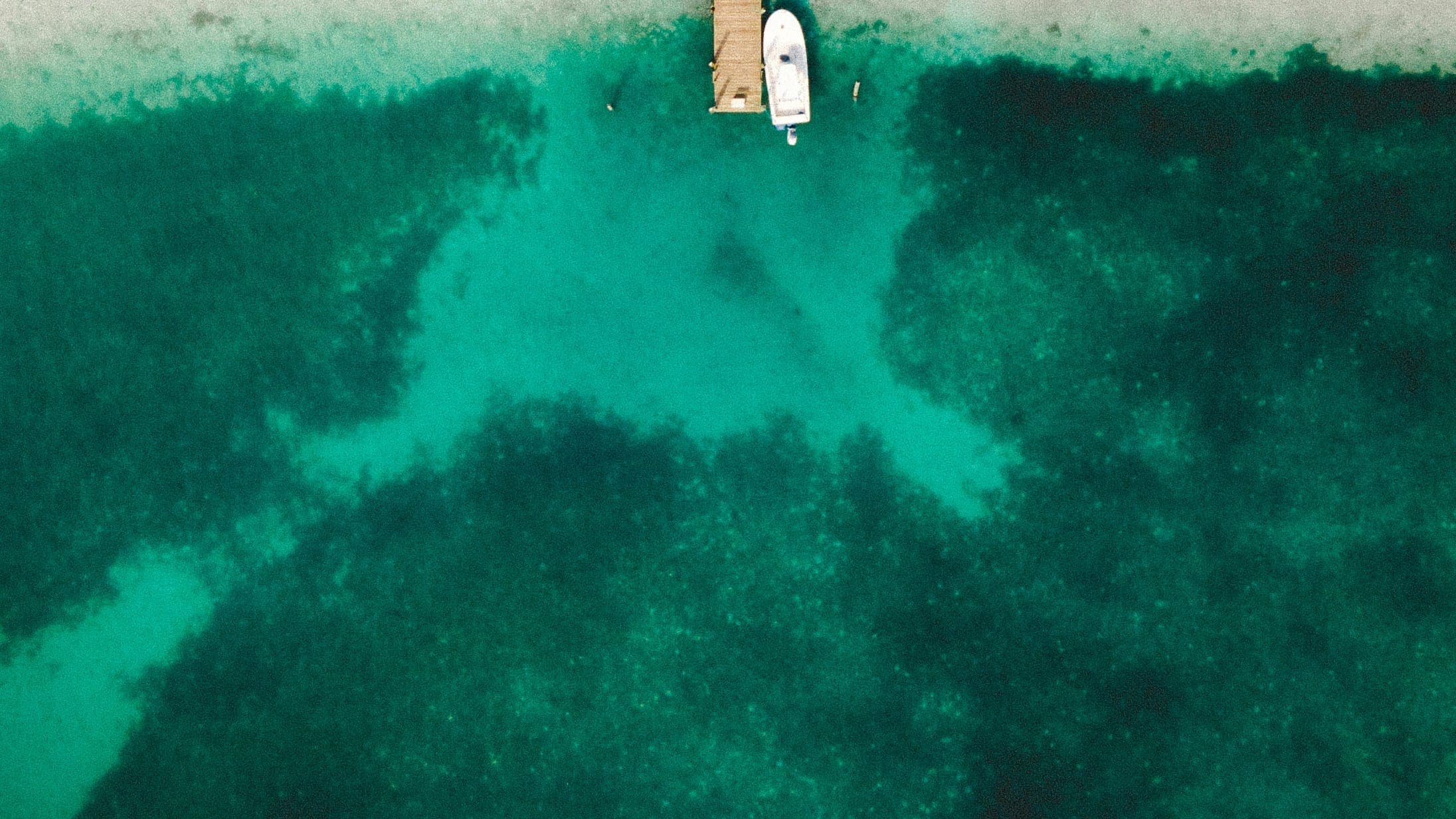 Aerial view of boats at a jetty off Manjack Cay in the Abacos, Bahamas