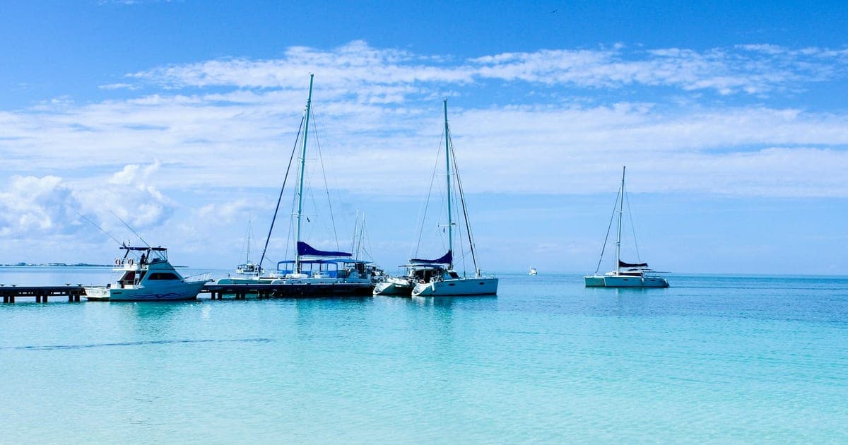 Yachts at anchor off a jetty in Varadero, Cuba